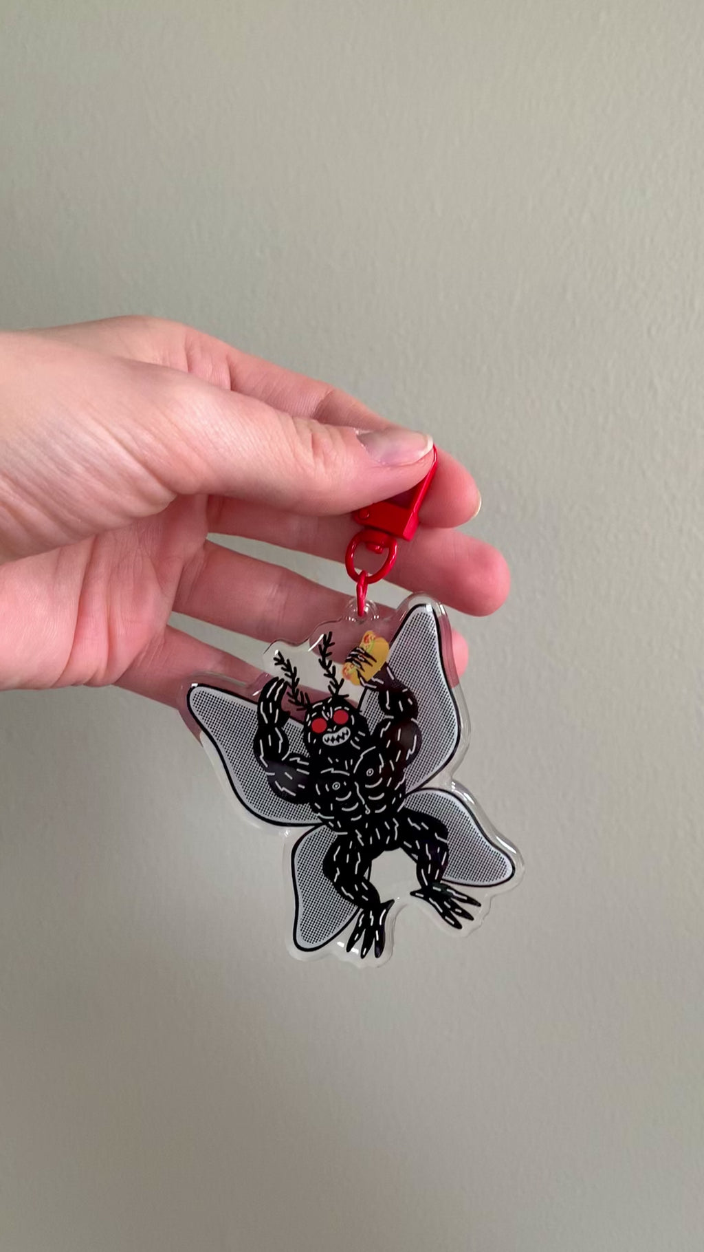 Mothman Holding Chicago Hot Dog Keychain